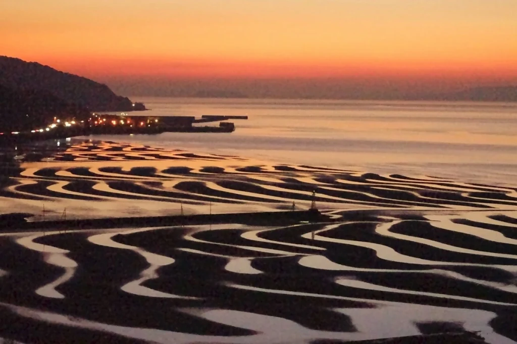 砂紋と夕日　池永清文